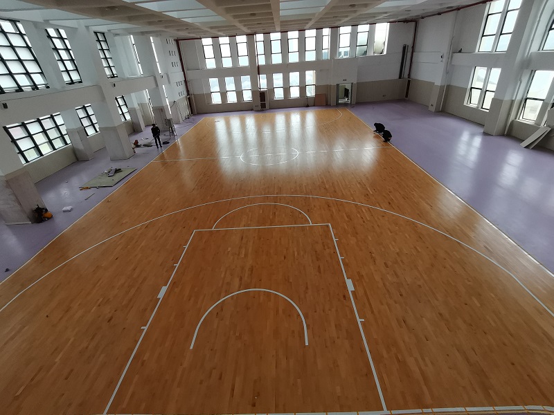 金华市浦江县岩头镇初级中学篮球馆木质地板案